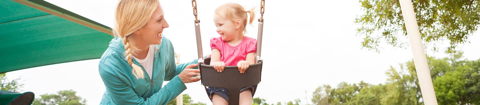 mother and daughter on the swing