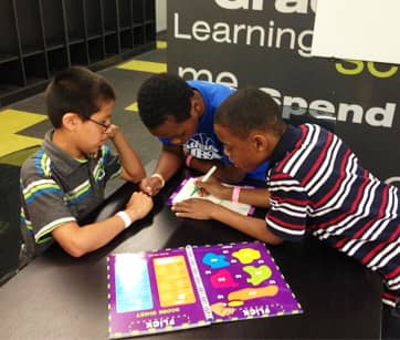 children doing math at the bauer community center